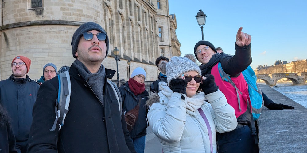 A guide with some tourists in Paris