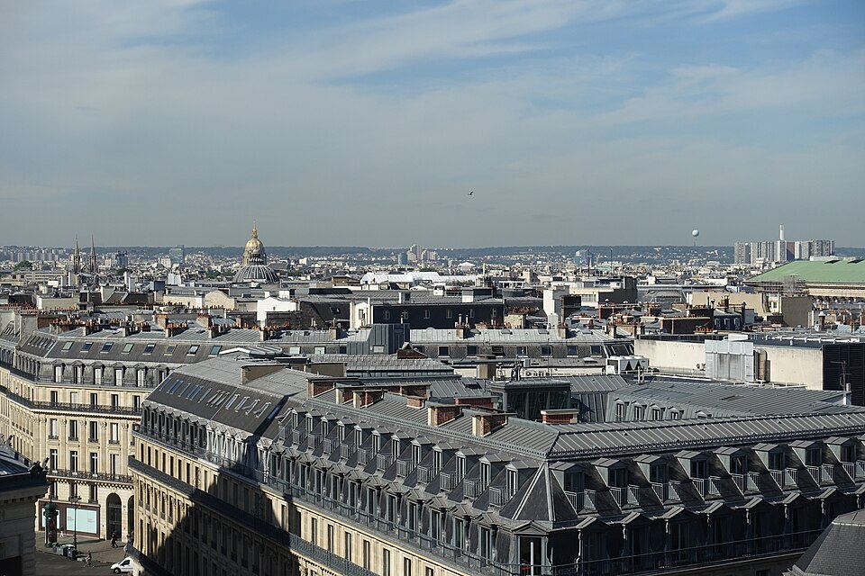 Free views of Paris from the Galeries Lafayette rooftop terrace overlooking Haussmann rooftops